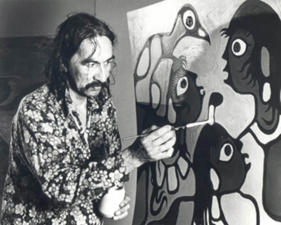 Art Canada Institute, Norval Morrisseau working on a painting while artist in residence at the McMichael Canadian Art Collection in 1979