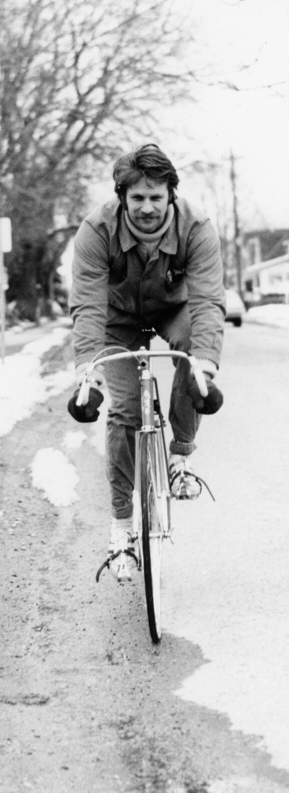 Art Canada Institute, Greg Curnoe, Greg Curnoe riding one of his bikes, c. 1974