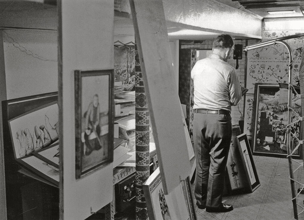 Art Canada Institute, William Kurelek, William Kurelek in the studio he built in the basement of his Toronto home, c. late 1960s / early 1970s